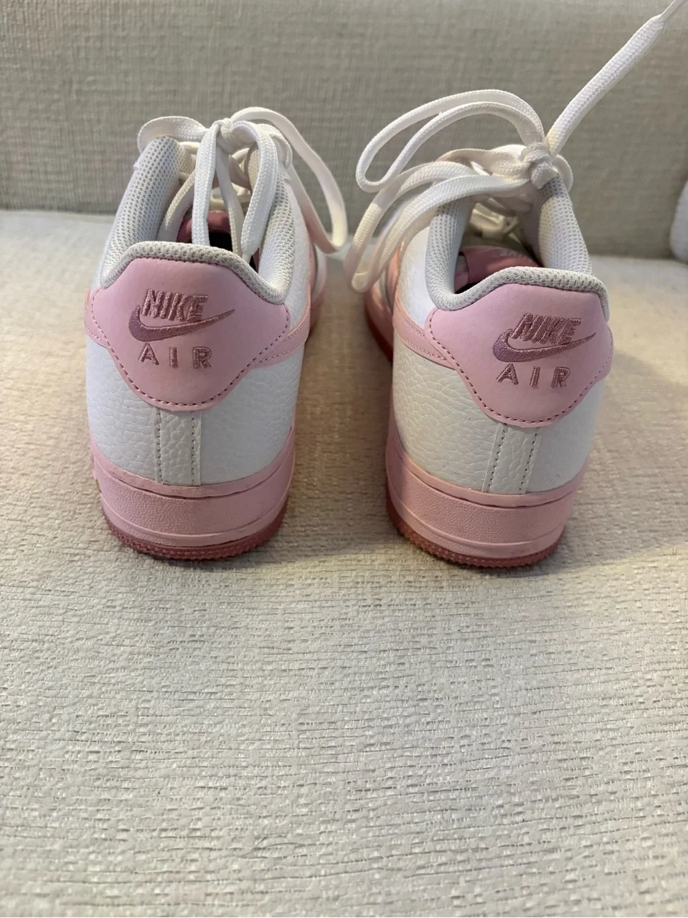 Nike Women’s White Sneakers with Pink Accents